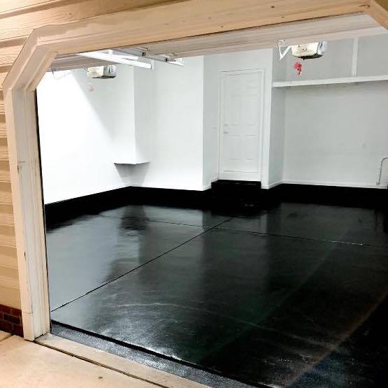 A Finished Garage with Black Resin Flooring for durability and style!