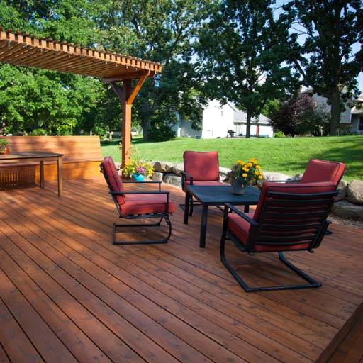 A freshly stained deck by The Honey Do Service master craftsmen